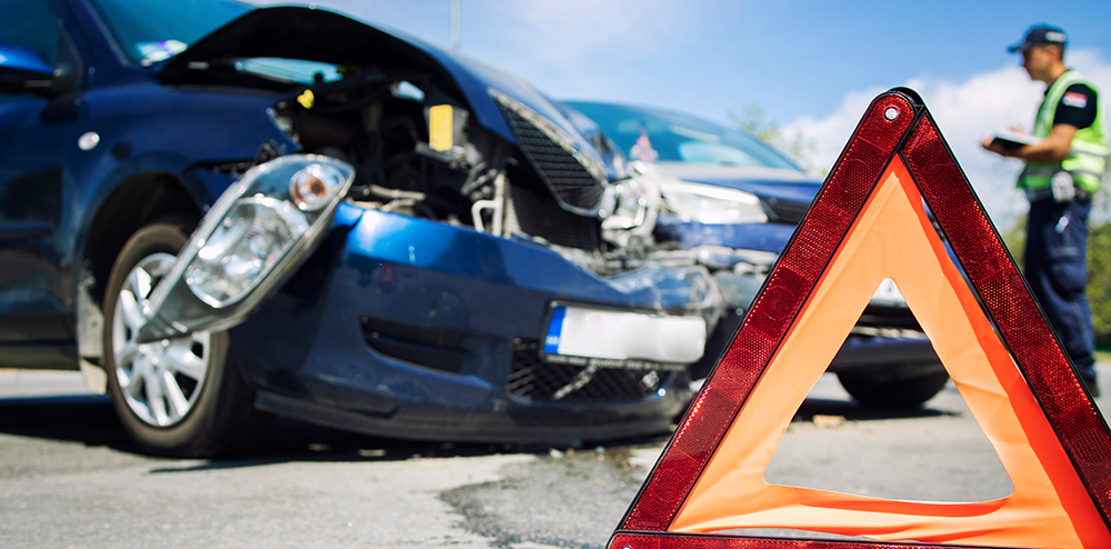 Road accident with smashed cars.